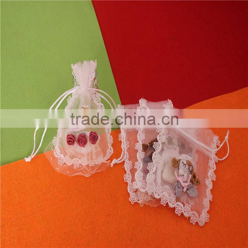China cheap drawstring organza gift bags with logo ribbon