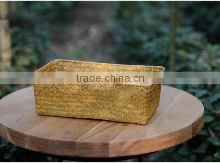 a basket made of natural straw seagrass for housewaring with no handle