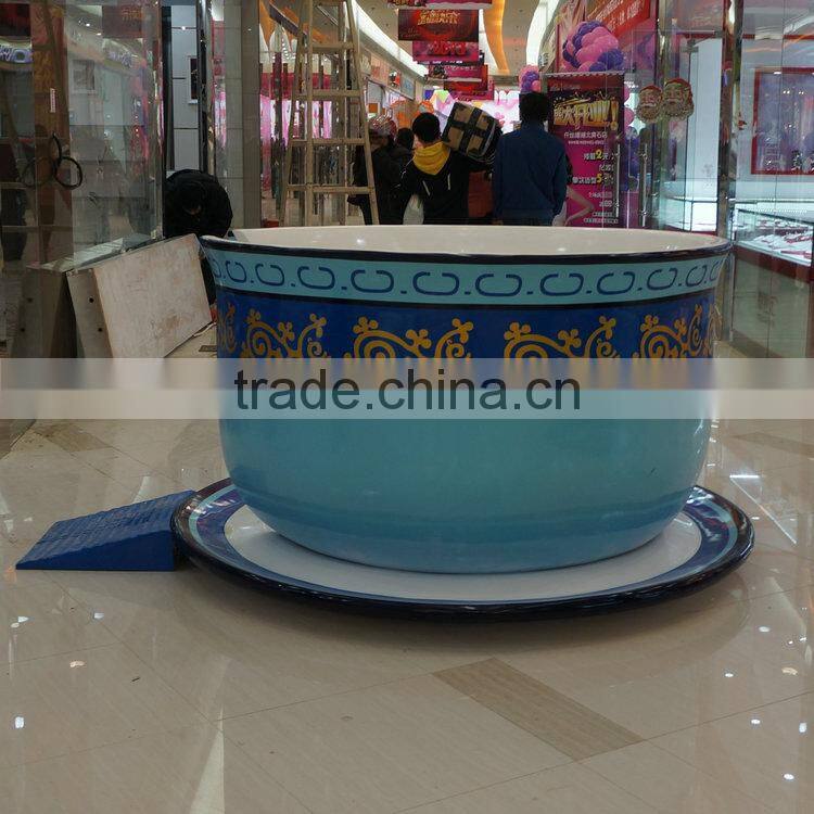 Large fiberglass coffee cup chair