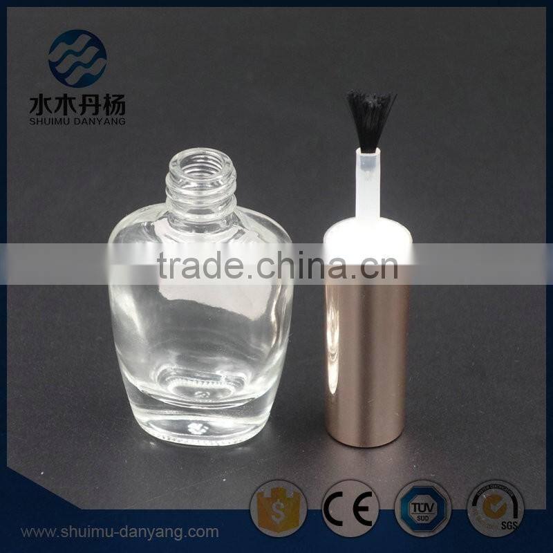 Flat clear cap with brush glass nail polish bottle