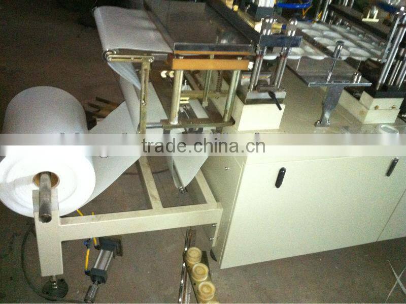 Full-automatic plastic cover making machine