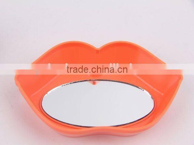 Lip shaped plastic massage comb with mirror/hair brush