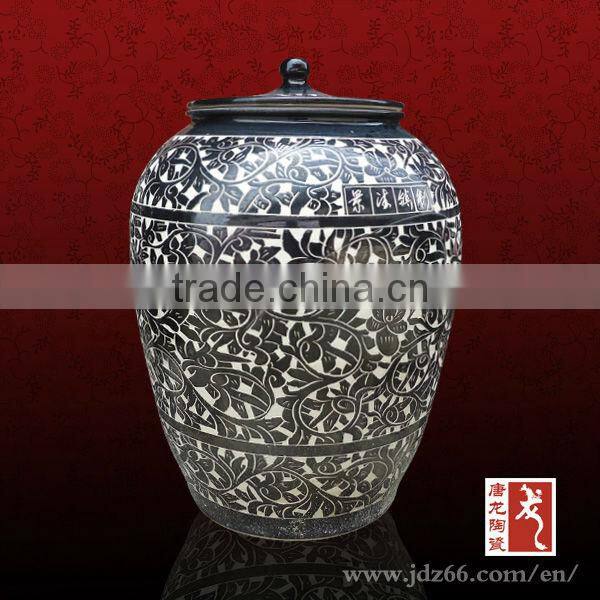 Black Glazed Ceramic Egg Container with Interlock Branch Lotus Decoration