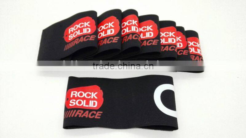Hook and loop armband with logo