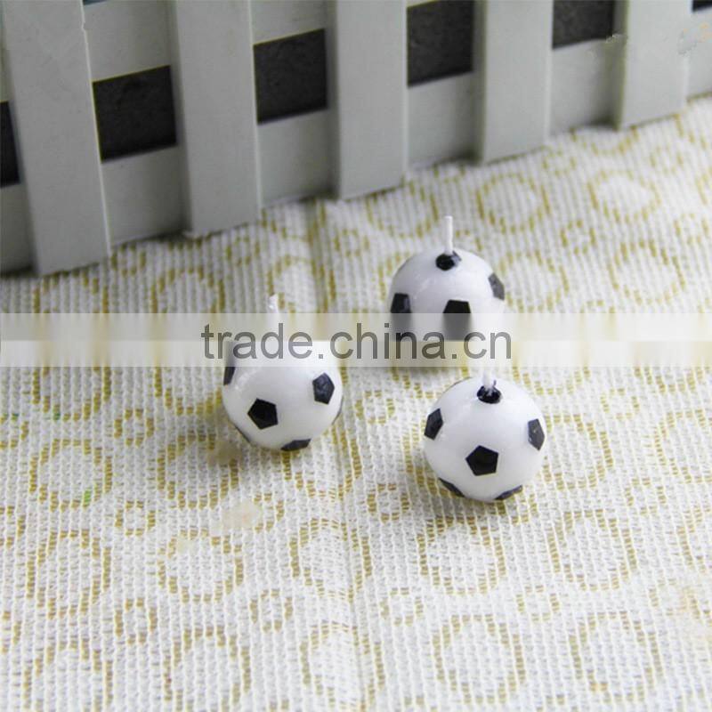 Football shaped birthday candles for party