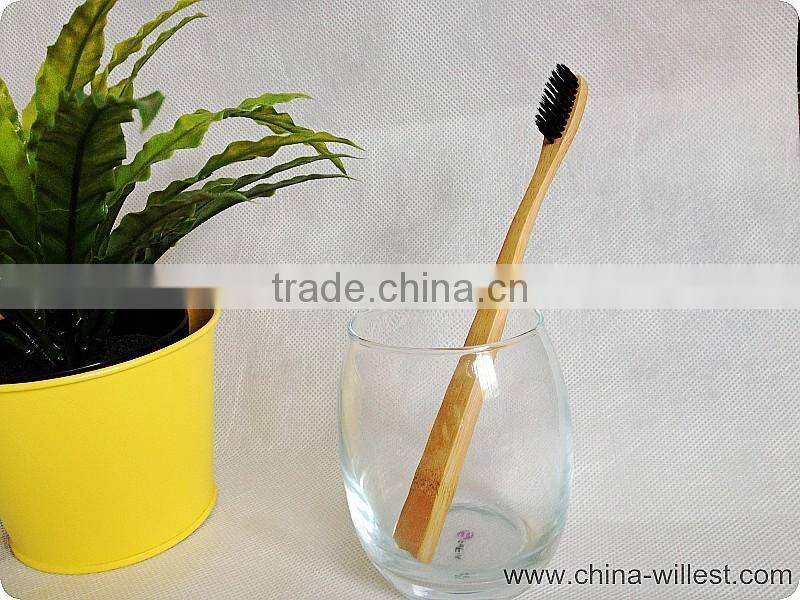 black bristle toothbrush with bamboo handle