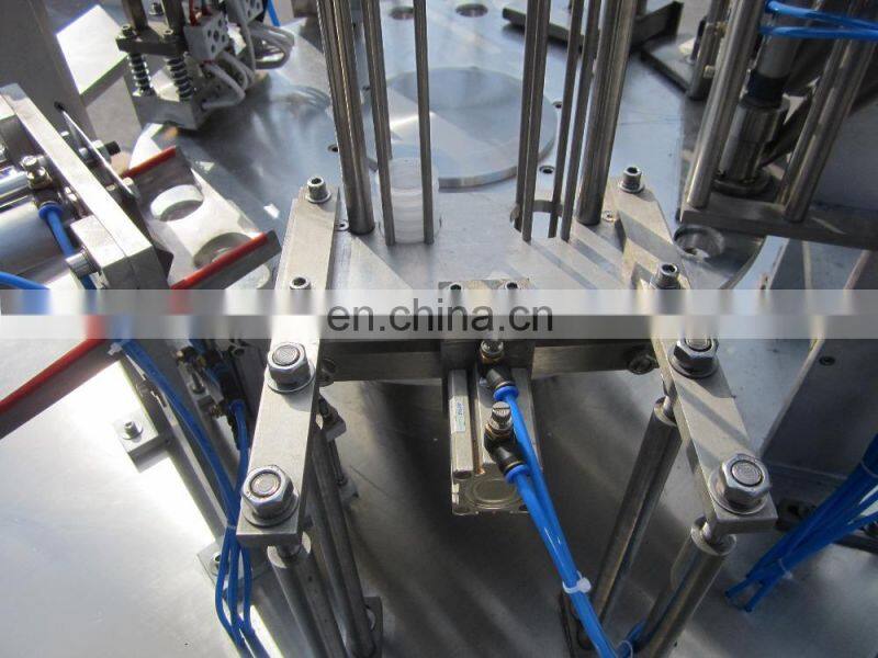 Factory Price rotary Cup Filling and sealing Machine for sauce