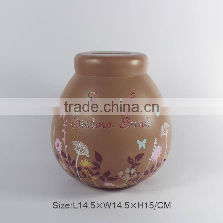 Polyresin decorative coin box