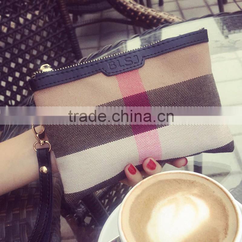 The new canvas with leather clutch cosmetic bag