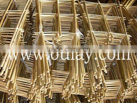 Hand-assembled bamboo trellis with small package