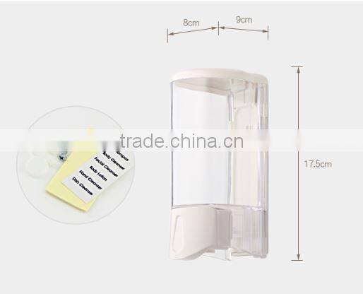 Clear plastic box of commercial liquid hand soap dispenser