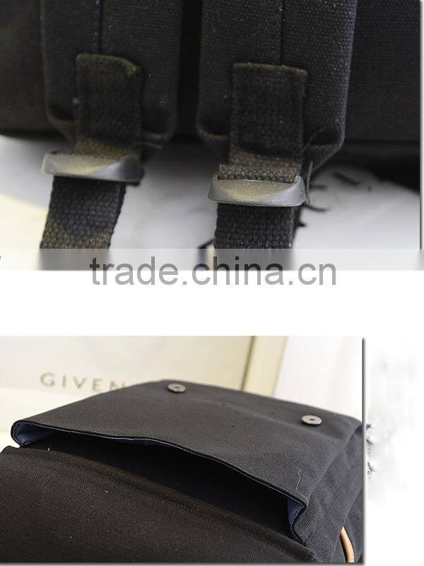 blue canvas travel backpack with laptop compartment