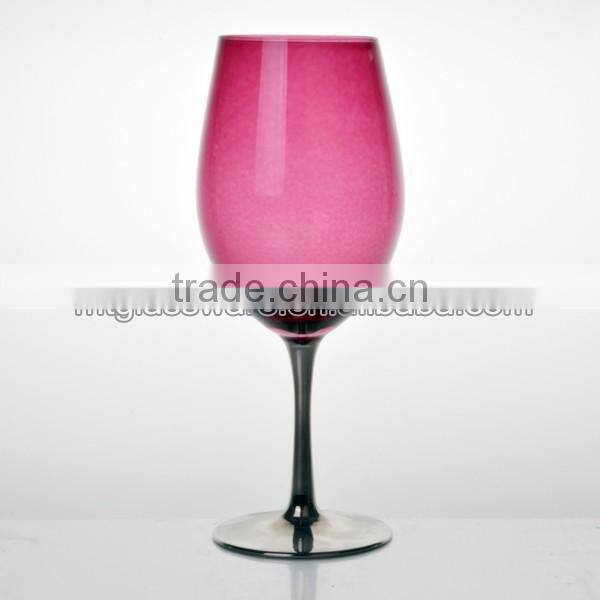 color red wine glass with silver stem and base