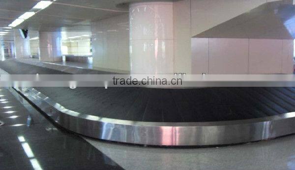 Airport baggage turntable carousel conveyor system