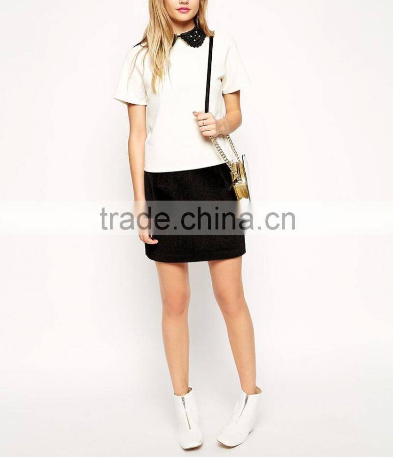 White short sleeve beaded ruffled beaded neckline top