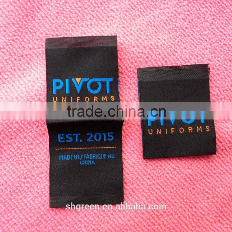 Wood spindle satin weaving label