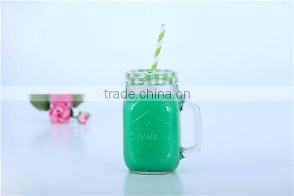 Clear glass mason jar mug with handle and metal lid
