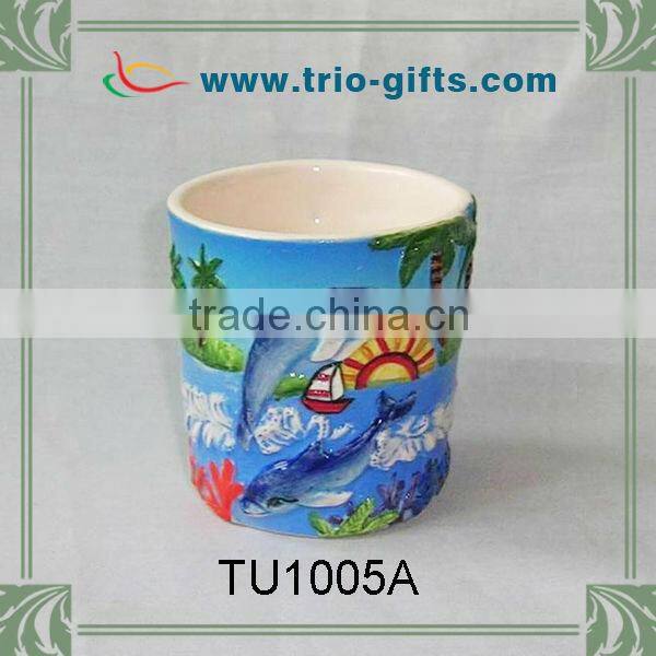 Ceramic tea or coffee cup dolphin design