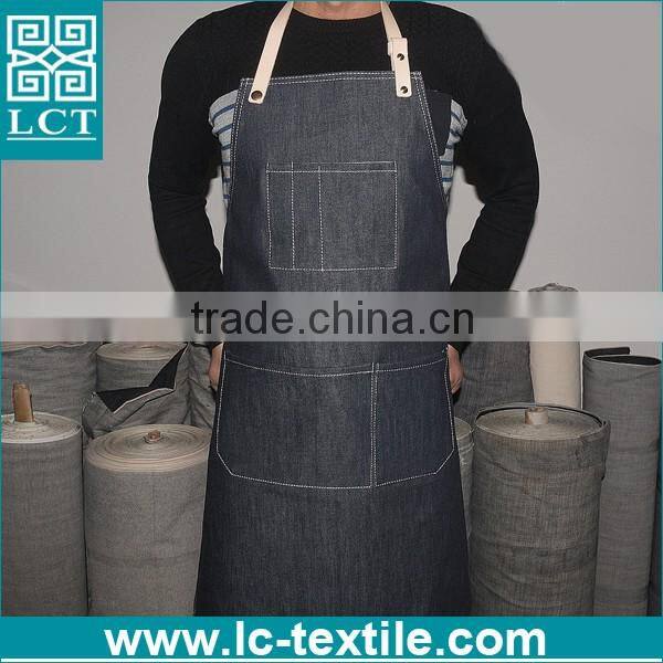 black denim apron with leather straps