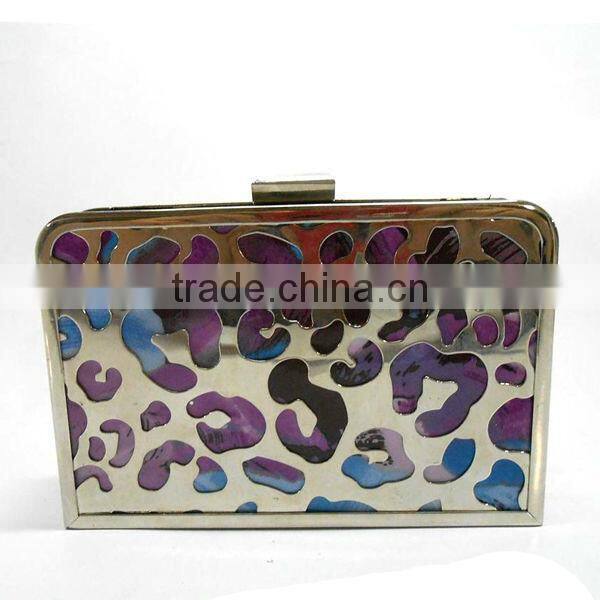 Matching metal frame clutch bag