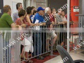 Out door orange painted crowd control for temp fence