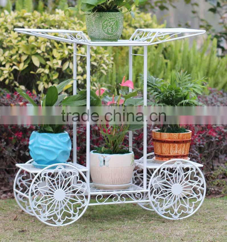 Wheelbarrow plant holder