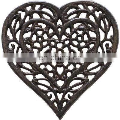 silver flower design trivet