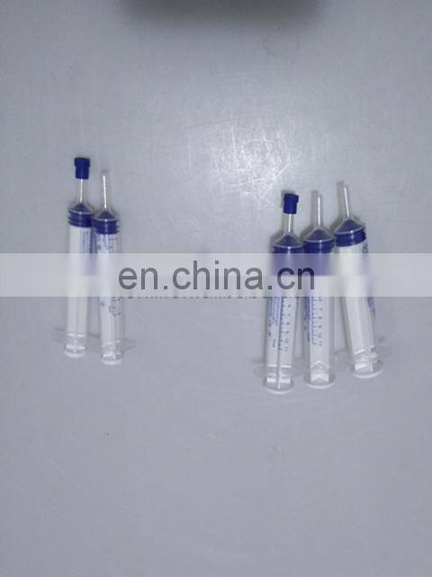 Plastic Syringe Filling and Closing Machine