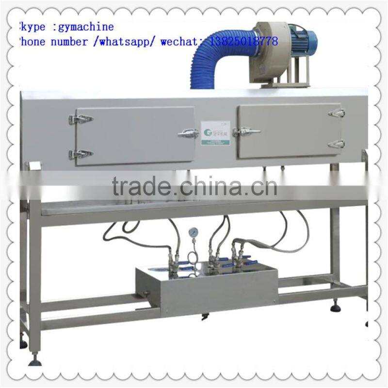 Shrink label sleeving machine