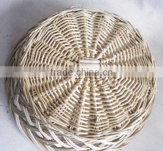 Handwoven round wicker rattan tray for food