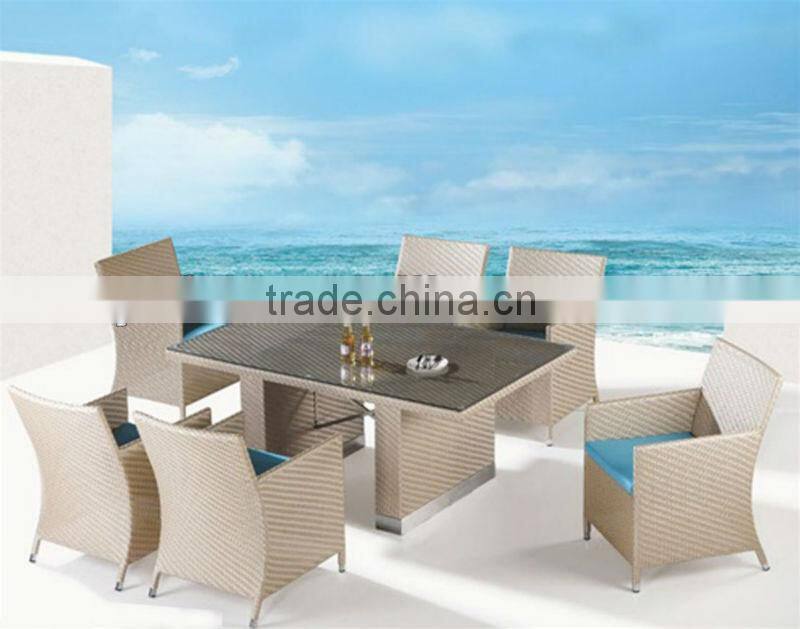 space-saving rattan hideaway dining table and chair set