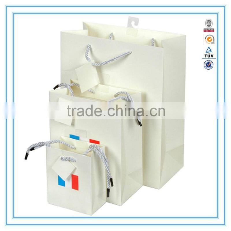 Alibaba china custom white luxury paper bag & brand paper bag printing logo with handles
