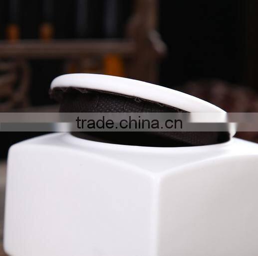 White galazed ceramic funeral pet ashes urns