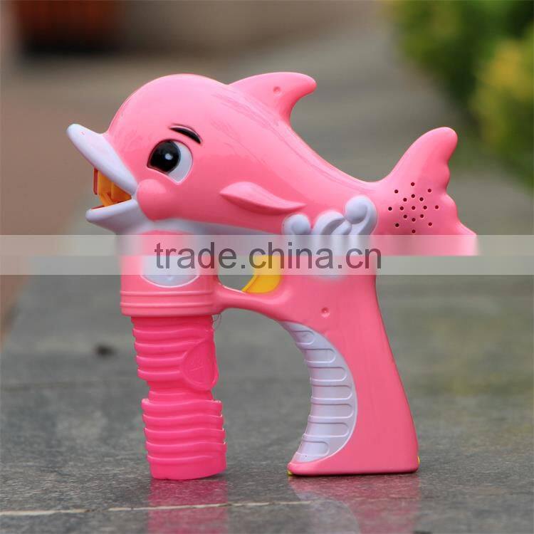 Battery operated blowing dolphin shaped bubble gun toy