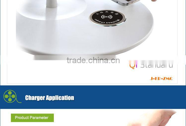 New smartphone Qi desktop wireless charger embedded on the furniture table