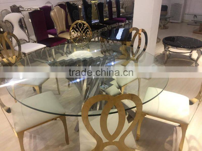 Modern round dining table stainless steel base