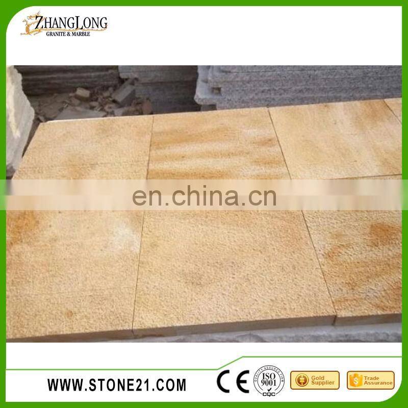sandstone cladding, rusty yellow sandstone