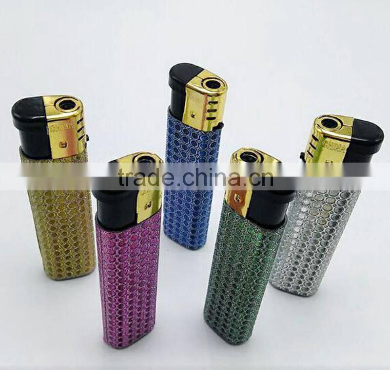 Silver match lighters colored with golden cap star lighter