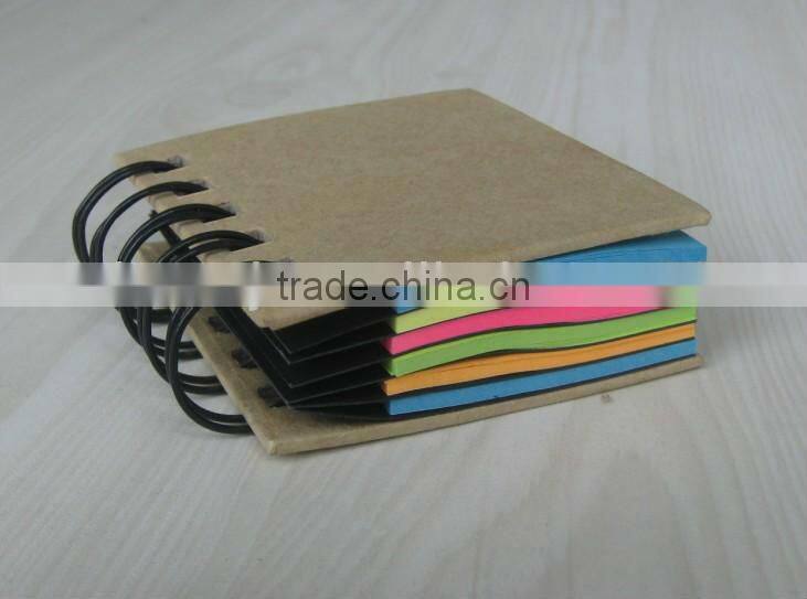 Mini spiral notebook with colorful noteflags
