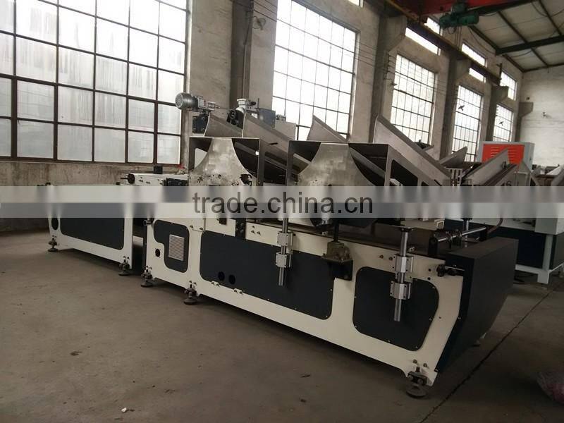 paperboard partition assembling machine