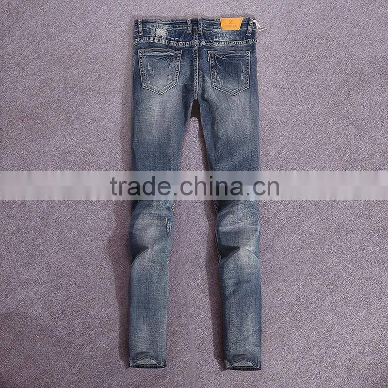 China jeans manufacture men ripped pattern plain badges jeans male vogue trouser