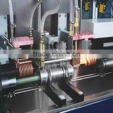 Round-link induction quenching and tempering equipment