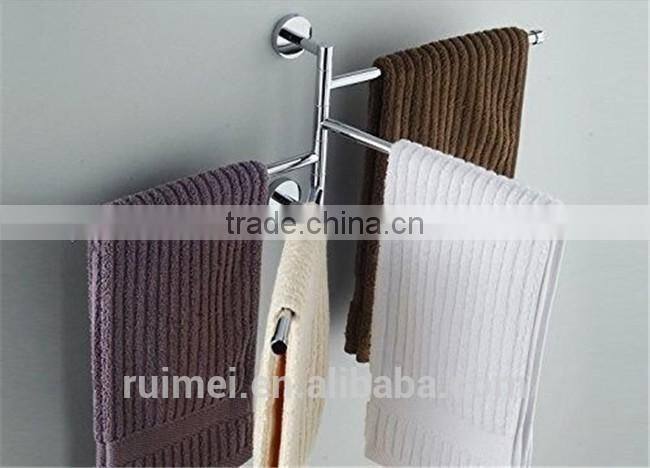 Stainless steel wall with folding towel rack