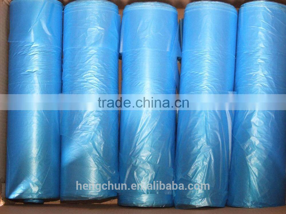 white disposable plastic apron