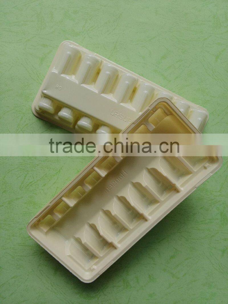 yellow divided plastic oral liquid bottle package tray, vial package tray