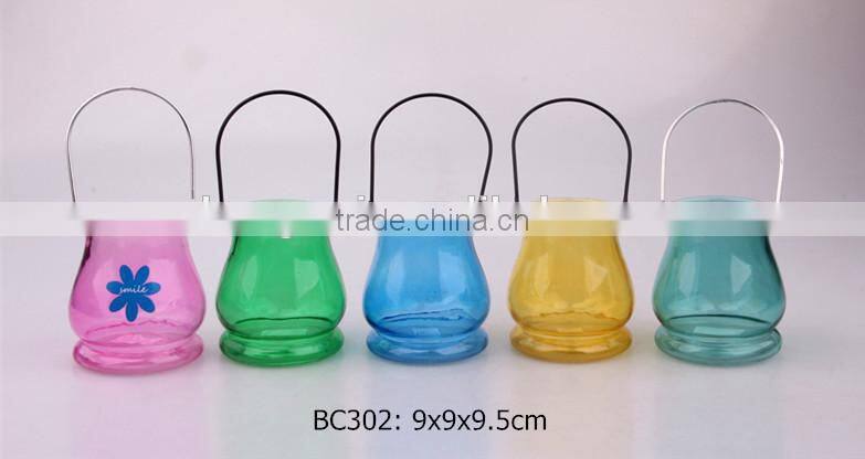 colorful glass jar with metal handle