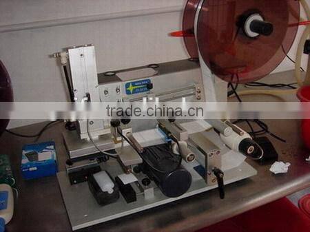 JF2014 Semi automatic round bottle sticker labeling machine for round bottles with printer