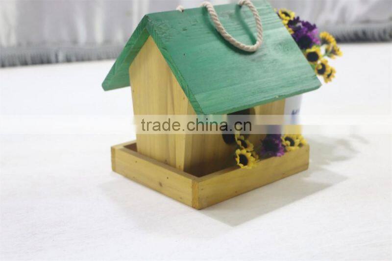 Finished colorful handmade wooden bird nest