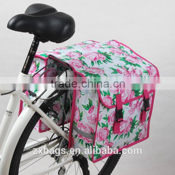 beautiful rose blossom pannier bike