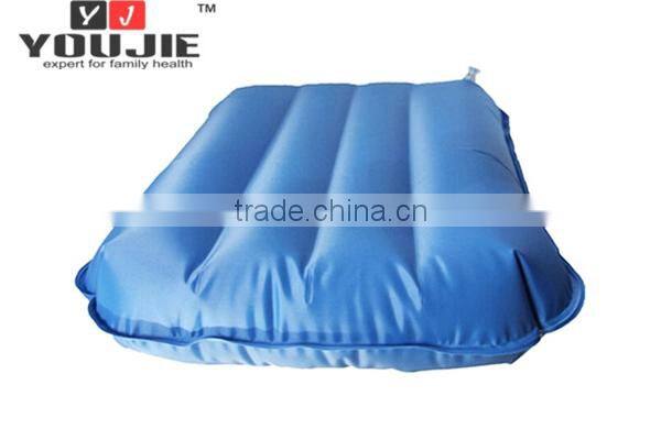 Blue inflatable leg support cushion